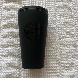 Dark green Starbucks cup
